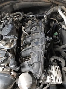 奥迪A6L C7 9.1万公里保养与进气系统“挖煤”及发动机挡板维护全记录